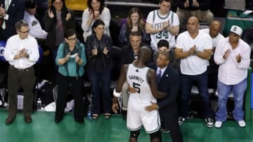 May 3, 2013; Boston, MA, USA; Boston Celtics forward/center Kevin Garnett (5) gets a hug from head coach Doc Rivers after leaving the game during the fourth quarter in game six of the first round of the 2013 NBA Playoffs against the New York Knicks at TD Garden. The New York Knicks won 88-80. Mandatory Credit: Greg M. Cooper-USA TODAY Sports