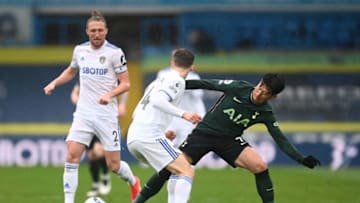 Tottenham Hotspur's South Korean striker Son Heung-Min (R) vies with Leeds United's Spanish defender Diego Llorente during the English Premier League football match between Leeds United and Tottenham Hotspur at Elland Road in Leeds, northern England on May 8, 2021. - . (Photo by MICHAEL REGAN/POOL/AFP via Getty Images)