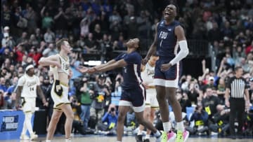 COLUMBUS, OHIO - MARCH 17: Joe Munden Jr. #1 of the Fairleigh Dickinson Knights celebrates after beating the Purdue Boilermakers 63-58 in the first round of the NCAA Men's Basketball Tournament at Nationwide Arena on March 17, 2023 in Columbus, Ohio. (Photo by Dylan Buell/Getty Images)