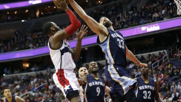 Dec 23, 2015; Washington, DC, USA; Memphis Grizzlies center Marc Gasol (33) blocks the shot of Washington Wizards guard John Wall (2) in the fourth quarter at Verizon Center. The Wizards won 100-91. Mandatory Credit: Geoff Burke-USA TODAY Sports