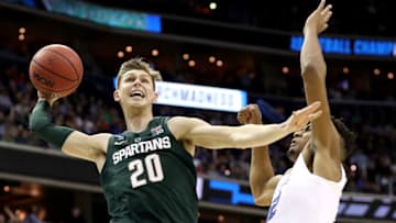 WASHINGTON, DC - MARCH 31: Matt McQuaid #20 of the Michigan State Spartans dunks the ball against the Duke Blue Devils during the first half in the East Regional game of the 2019 NCAA Men's Basketball Tournament at Capital One Arena on March 31, 2019 in Washington, DC. (Photo by Patrick Smith/Getty Images)