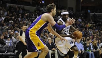 Feb 26, 2014; Memphis, TN, USA; Memphis Grizzlies power forward Zach Randolph (50) drives to the basket against Los Angeles Lakers center Pau Gasol (16) during the game at FedExForum. Mandatory Credit: Justin Ford-USA TODAY Sports