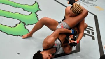 AUCKLAND, NEW ZEALAND - FEBRUARY 23: (L-R) Angela Hill attempts to secure an arm bar submission against Loma Lookboonmee of Thailand in their strawweight bout during the UFC Fight Night event at Spark Arena on February 23, 2020 in Auckland, New Zealand. (Photo by Jeff Bottari/Zuffa LLC)