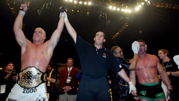 (Las Vegas)UFC Champion Tito Ortiz (lt) reveled in his victory over contender Ken Shamrock (far right) at the MGM Grand Arena in Las Vegas in the Ultimate Fighting Championship 40 "Vendetta" on November 22, 2002. (Photo by Mark Boster/Los Angeles Times via Getty Images)
