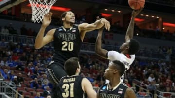 Mar 19, 2015; Louisville, KY, USA; Cincinnati Bearcats forward Shaquille Thomas (3) shoots the ball against Purdue Boilermakers center A.J. Hammons (20) during the first half in the second round of the 2015 NCAA Tournament at KFC Yum! Center. Mandatory Credit: Brian Spurlock-USA TODAY Sports