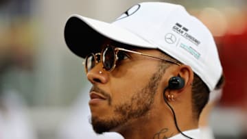 ABU DHABI, UNITED ARAB EMIRATES - NOVEMBER 26: Lewis Hamilton of Great Britain and Mercedes GP on the grid before the Abu Dhabi Formula One Grand Prix at Yas Marina Circuit on November 26, 2017 in Abu Dhabi, United Arab Emirates. (Photo by Mark Thompson/Getty Images)