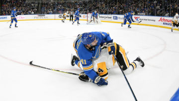 ST. LOUIS, MO. - DECEMBER 29: St. Louis Blues defenseman Robert Bortuzzo (41) falls over Pittsburgh Penguins leftwing Tanner Pearson (14) during an NHL game between the Pittsburgh Penguins and the St. Louis Blues on December 29, 2018, at Enterprise Center, St. Louis, MO. (Photo by Keith Gillett/Icon Sportswire via Getty Images)