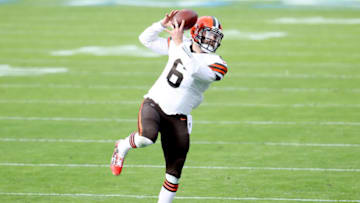 NASHVILLE, TENNESSEE - DECEMBER 06: Quarterback Baker Mayfield #6 of the Cleveland Browns catches a pass against the Tennessee Titans in the first quarter in the first quarter at Nissan Stadium on December 06, 2020 in Nashville, Tennessee. (Photo by Andy Lyons/Getty Images)