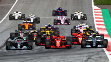 SPIELBERG, AUSTRIA - JULY 01: Lewis Hamilton of Great Britain driving the (44) Mercedes AMG Petronas F1 Team Mercedes WO9, Sebastian Vettel of Germany driving the (5) Scuderia Ferrari SF71H and Valtteri Bottas driving the (77) Mercedes AMG Petronas F1 Team Mercedes WO9 (Photo by Mark Thompson/Getty Images)