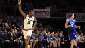 Jan 25, 2016; Coral Gables, FL, USA; Miami Hurricanes guard Davon Reed (5) reacts after making a three point basket against the Duke Blue Devils during the first half at BankUnited Center. Mandatory Credit: Steve Mitchell-USA TODAY Sports