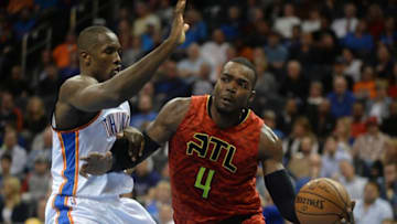 Dec 10, 2015; Oklahoma City, OK, USA; Atlanta Hawks forward Paul Millsap (4) during the game against Oklahoma City Thunder forward Serge Ibaka (9) during the fourth quarter at Chesapeake Energy Arena. Mandatory Credit: Mark D. Smith-USA TODAY Sports