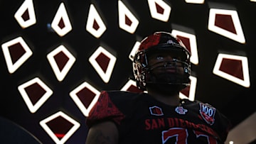 Sep 24, 2022; San Diego, California, USA; San Diego State Aztecs offensive lineman Josh Simmons (77) looks on before the game against the Toledo Rockets at Snapdragon Stadium. Mandatory Credit: Orlando Ramirez-USA TODAY Sports