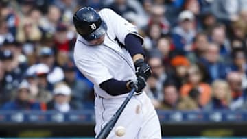 Apr 8, 2016; Detroit, MI, USA; Detroit Tigers third baseman Nick Castellanos (9) hits a single in the fourth inning against the New York Yankees at Comerica Park. Mandatory Credit: Rick Osentoski-USA TODAY Sports