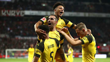 LEVERKUSEN, GERMANY - SEPTEMBER 29: Paco Alcacer (2nd L) of Borussia Dortmund celebrates with teammates after scoring his team's third goal during the Bundesliga match between Bayer 04 Leverkusen and Borussia Dortmund at BayArena on September 29, 2018 in Leverkusen, Germany. (Photo by Lars Baron/Bongarts/Getty Images)