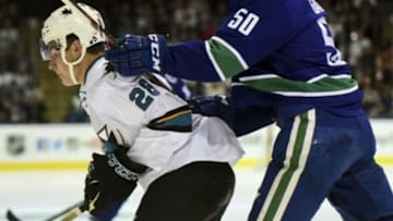 Sep 21, 2015; Victoria, British Columbia, CAN; Vancouver Canucks forward Brendan Gaunce (50) collides with San Jose Sharks forward Timo Meier (28) during the first period at Q Centre. Mandatory Credit: Anne-Marie Sorvin-USA TODAY Sports