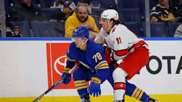 Oct 4, 2022; Buffalo, New York, USA; Buffalo Sabres defenseman Jacob Bryson (78) and Carolina Hurricanes center Jamieson Rees (81) race for a loose puck during the third period at KeyBank Center. Mandatory Credit: Timothy T. Ludwig-USA TODAY Sports