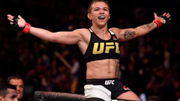 RIO DE JANEIRO, BRAZIL - JUNE 03: Claudia Gadelha of Brazil celebrates after her submission victory over Karolina Kowalkiewicz of Poland in their womens strawweight bout during the UFC 212 event at Jeunesse Arena on June 3, 2017 in Rio de Janeiro, Brazil. (Photo by Jeff Bottari/Zuffa LLC/Zuffa LLC via Getty Images)