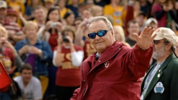 BOB SELF/The Times-Union-12/31/09--Florida State head football coach Bobby Bowden waves to fans along the parade route Thursday afternoon. Thursday afternoon the city of Jacksonville hosted the Winn-Dixie Hometown Gator Bowl Parade with Florida State head football coach Bobby Bowden serving as the Grand Marshal. The parade route was filled with Florida State University and West Virginia fans here for Friday's bowl match up. (The Florida Times-Union, Bob Self)Met 02gatorbowlparad