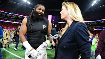 ATLANTA, GA - NOVEMBER 12: Adrian Clayborn #99 of the Atlanta Falcons is interviewed by Erin Andrews of Fox Sports after the game against the Dallas Cowboys at Mercedes-Benz Stadium on November 12, 2017 in Atlanta, Georgia. (Photo by Scott Cunningham/Getty Images)