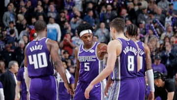 SACRAMENTO, CA - FEBRUARY 8: De'Aaron Fox #5 of the Sacramento Kings high fives his teammates during the game against the Miami Heat on February 8, 2019 at Golden 1 Center in Sacramento, California. NOTE TO USER: User expressly acknowledges and agrees that, by downloading and/or using this photograph, user is consenting to the terms and conditions of the Getty Images License Agreement. Mandatory Copyright Notice: Copyright 2019 NBAE (Photo by Rocky Widner/NBAE via Getty Images)