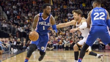 Dec 20, 2015; Cleveland, OH, USA; Philadelphia 76ers guard Tony Wroten (1) drives on Cleveland Cavaliers guard Matthew Dellavedova (8) during the second quarter at Quicken Loans Arena. Mandatory Credit: Ken Blaze-USA TODAY Sports