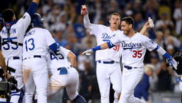 LOS ANGELES, CALIFORNIA - JULY 03: Cody Bellinger #35 of the Los Angeles Dodgers celebrates his walk off solo homerun, for a 5-4 win over the Arizona Diamondbacks, during the tenth inning at Dodger Stadium on July 03, 2019 in Los Angeles, California. (Photo by Harry How/Getty Images)