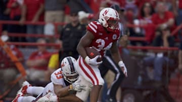 Oct 1, 2016; Lincoln, NE, USA; Nebraska Cornhuskers running back Terrell Newby (34) runs against the Illinois Fighting Illini linebacker Tr Watson (33) in the second half at Memorial Stadium. Nebraska won 31-16. Mandatory Credit: Bruce Thorson-USA TODAY Sports
