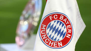 Bayern Munich flag with Bundesliga trophy. (Photo by Alexander Hassenstein/Getty Images)