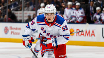 TORONTO, ON - MARCH 23: John Gilmour #58 of the New York Rangers skates against the Toronto Maple Leafs during the second period at the Scotiabank Arena on March 23, 2019 in Toronto, Ontario, Canada. (Photo by Kevin Sousa/NHLI via Getty Images)
