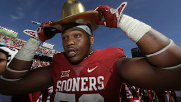 DALLAS, TX - OCTOBER 08: Orlando Brown #78 of the Oklahoma Sooners wears the Golden Hat trophy after a 45-40 win against the Texas Longhorns at Cotton Bowl on October 8, 2016 in Dallas, Texas. (Photo by Ronald Martinez/Getty Images)