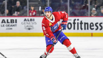 LAVAL, QC, CANADA - APRIL 3: Josh Brooks #8 of the Laval Rocket skates up the ice in control of the puck against the Cleveland Monsters at Place Bell on April 3, 2019 in Laval, Quebec. (Photo by Stephane Dube /Getty Images)