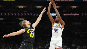 Oct 28, 2023; Phoenix, Arizona, USA; Phoenix Suns forward Kevin Durant (35) shoots over Utah Jazz forward Kelly Olynyk (41) during the second half at Footprint Center. Mandatory Credit: Joe Camporeale-USA TODAY Sports