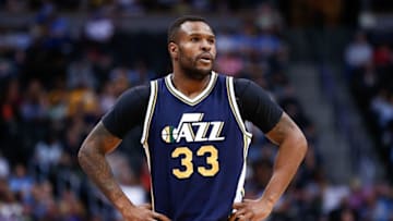 Apr 10, 2016; Denver, CO, USA; Utah Jazz forward Trevor Booker (33) in the third quarter against the Denver Nuggets at the Pepsi Center. Mandatory Credit: Isaiah J. Downing-USA TODAY Sports
