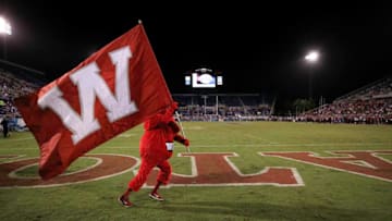 BOCA RATON, FL - DECEMBER 20: The Western Kentucky Hilltoppers mascot Big Red carries a flag during the game against the Memphis Tigers at FAU Stadium on December 20, 2016 in Boca Raton, Florida. (Photo by Rob Foldy/Getty Images)