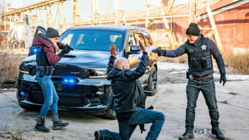 CHICAGO P.D. -- "Instinct" Episode 807 -- Pictured: (l-r) Tracy Spiridakos as Hailey Upton, Jason Beghe as Hank Voight -- (Photo by: Matt Dinerstein/NBC)
