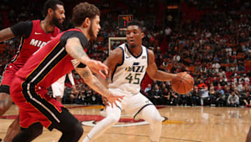 MIAMI, FL - JANUARY 7: Donovan Mitchell #45 of the Utah Jazz dribbles the ball against the Miami Heat on January 7, 2018 at American Airlines Arena in Miami, Florida. NOTE TO USER: User expressly acknowledges and agrees that, by downloading and or using this photograph, user is consenting to the terms and conditions of the Getty Images License Agreement. Mandatory Copyright Notice: Copyright 2018 NBAE (Photo by Issac Baldizon/NBAE via Getty Images)