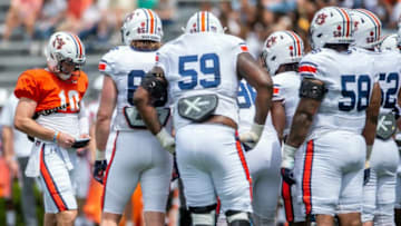 Auburn football quarterback Bo Nix (10) huddles with his team during Auburn football A-Day spring game at Jordan-Hare Stadium in Auburn, Ala., on Saturday, April 17, 2021.