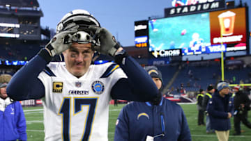 FOXBOROUGH, MASSACHUSETTS - JANUARY 13: Philip Rivers #17 of the Los Angeles Chargers reacts as he walks off the field after the AFC Divisional Playoff Game against the New England Patriots at Gillette Stadium on January 13, 2019 in Foxborough, Massachusetts. (Photo by Elsa/Getty Images)