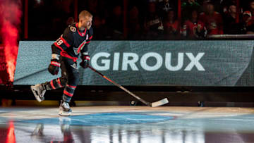 Oct 18, 2022; Ottawa, Ontario, CAN; Ottawa Senators right wing Claude Giroux (28) skates up the ice as he is introduced prior to the start of game against the Boston Bruins at the Canadian Tire Centre. Mandatory Credit: Marc DesRosiers-USA TODAY Sports