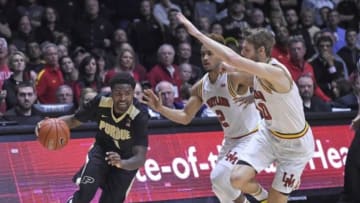Feb 27, 2016; West Lafayette, IN, USA; Purdue Boilermakers guard Johnny Hill (1) moves past Maryland Terrapins guard Melo Trimble (2) and forward Jake Layman (10) in the 2nd half at Mackey Arena. Purdue won the game 83-79. Mandatory Credit: Sandra Dukes-USA TODAY Sports