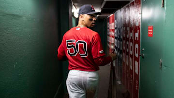 BOSTON, MA - SEPTEMBER 29: Mookie Betts #50 of the Boston Red Sox walks through the tunnel after scoring the game winning run on a walk-off single hit by Rafael Devers #11 during the ninth inning of a game against the Baltimore Orioles on September 29, 2019 at Fenway Park in Boston, Massachusetts. (Photo by Billie Weiss/Boston Red Sox/Getty Images)