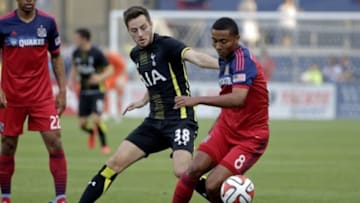 Jul 26, 2014; Bridgeview, IL, USA; Tottenham Hotspur midfielder Ryan Mason (38) and Chicago Fire midfielder Grant Ward (8) battle for possession during a friendly at Toyota Park. Tottenham Hotspur won the match 2-0. Mandatory Credit: Jon Durr-USA TODAY Sports