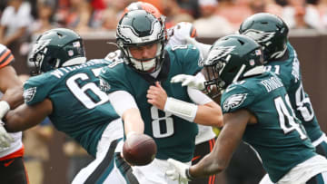 Aug 21, 2022; Cleveland, Ohio, USA; Philadelphia Eagles quarterback Carson Strong (8) hands off to running back Kennedy Brooks (49) during the second half against the Cleveland Browns at FirstEnergy Stadium. Mandatory Credit: Ken Blaze-USA TODAY Sports
