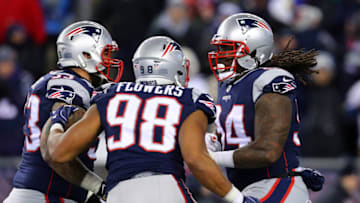 FOXBOROUGH, MA - JANUARY 13: Ricky Jean Francois #94 of the New England Patriots reacts with Kyle Van Noy #53 and Trey Flowers #98 after a sack during the fourth quarter in the AFC Divisional Playoff game against the Tennessee Titans at Gillette Stadium on January 13, 2018 in Foxborough, Massachusetts. (Photo by Maddie Meyer/Getty Images)