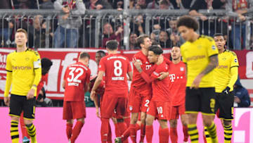 MUNICH, GERMANY - NOVEMBER 09: Thomas Muller of FC Bayern Munich celebrates with teammate Philippe Coutinho after their team's fourth goal during the Bundesliga match between FC Bayern Muenchen and Borussia Dortmund at Allianz Arena on November 09, 2019 in Munich, Germany. (Photo by Sebastian Widmann/Bongarts/Getty Images)