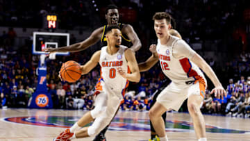 Jan 14, 2023; Gainesville, Florida, USA; Florida Gators guard Myreon Jones (0) drives to the basket during the second half against the Missouri Tigers at Exactech Arena at the Stephen C. O'Connell Center. Mandatory Credit: Matt Pendleton-USA TODAY Sports