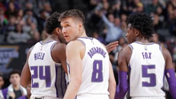 SACRAMENTO, CA - JANUARY 12: Buddy Hield #24, Bogdan Bogdanovic #8 and De'Aaron Fox #5 of the Sacramento Kings face the Charlotte Hornets on January 12, 2019 at Golden 1 Center in Sacramento, California. NOTE TO USER: User expressly acknowledges and agrees that, by downloading and or using this photograph, User is consenting to the terms and conditions of the Getty Images Agreement. Mandatory Copyright Notice: Copyright 2019 NBAE (Photo by Rocky Widner/NBAE via Getty Images)