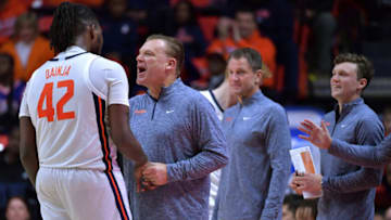 Nov 24, 2023; Champaign, Illinois, USA; Illinois Fighting Illini forward Dain Dainja (42) talks to head coach Brian Underwood in the second half against the Western Illinois Leathernecks at State Farm Center. Mandatory Credit: Ron Johnson-USA TODAY Sports