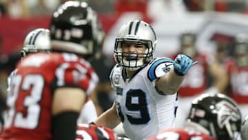 Dec 27, 2015; Atlanta, GA, USA; Carolina Panthers middle linebacker Luke Kuechly (59) yells at the line of scrimmage against the Atlanta Falcons in the third quarter at the Georgia Dome. Mandatory Credit: Jason Getz-USA TODAY Sports