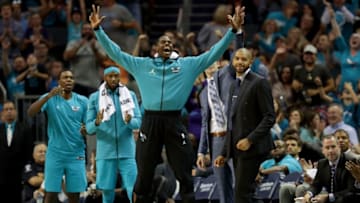 CHARLOTTE, NC - OCTOBER 20: Marvin Williams #2 of the Charlotte Hornets and the bench of the Charlotte Hornets react after a play against the Atlanta Hawks during their game at Spectrum Center on October 20, 2017 in Charlotte, North Carolina. NOTE TO USER: User expressly acknowledges and agrees that, by downloading and or using this photograph, User is consenting to the terms and conditions of the Getty Images License Agreement. (Photo by Streeter Lecka/Getty Images)